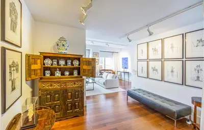 a living room with a couch and a table at Casa Hernán in Cádiz