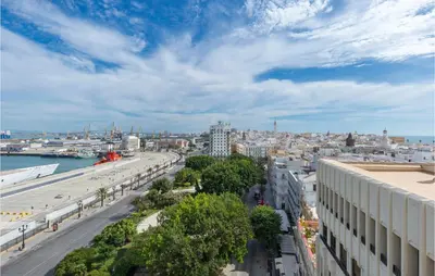 a view of a city with a street and buildings at Casa Hernán in Cádiz
