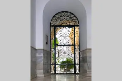 a door in a building with a gate at GATU Villa Palma, aire acc y confort en el centro histórico, 