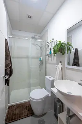 a bathroom with a shower and a toilet and a sink at Casa Maroca in Cádiz