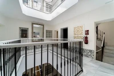 a staircase in a house with a skylight at Fabio Catedral I in Cádiz