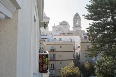 a view of a city from a window of a building at Jardines de Candelaria Cadiz in Cádiz