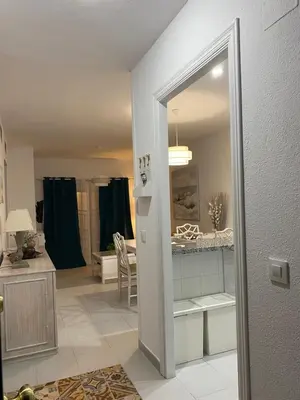 a room with a kitchen and a dining room at NOVO SANCTI PETRI - CASA CON ENCANTO in Novo Sancti Petri