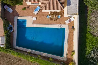 an overhead view of a swimming pool in a backyard at Villa Elissa with 3 bedrooms andpool and views close to Conil in Cádiz