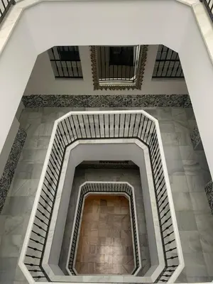 a view from the top of a building with stairs at Apartamento Entrecatedrales in Cádiz