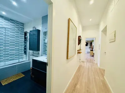 a bathroom with a sink and a mirror at MANA home Keep calm feel the light and shine in Cádiz