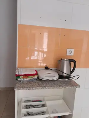 a kitchen counter with a tea kettle on top of it at La Casona de Rances Grupo AC Gestion in Cádiz