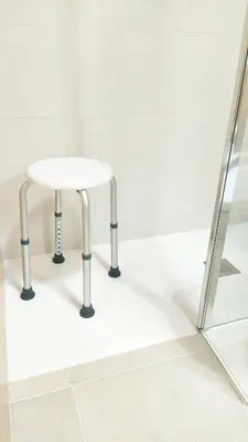 a stool in a room next to a mirror at RELAX CHICLANA-Aparcamiento privado-TV Cable-WifiPlus-Aire Acond-Incluido in Chiclana de la Frontera
