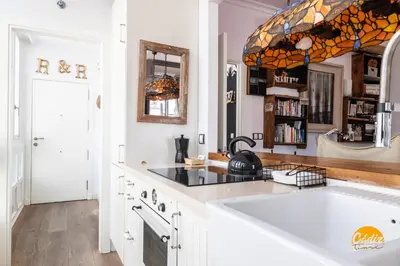 a kitchen with a sink and a counter top at La Bella Escondida by Cadiz Time in Cádiz