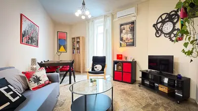 a living room with a couch and a table at Cadiz Cinema Grupo AC Gestion in Cádiz