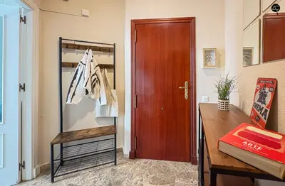 a room with a desk and a wooden door at Cadiz Cinema Grupo AC Gestion in Cádiz