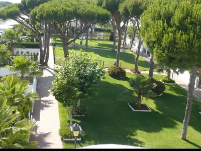 an aerial view of a park with trees and grass at Apartamento la Barrosa ,Urb los Veleros in Chiclana de la Frontera