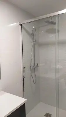 a shower with a glass door in a bathroom at AZAHAR-Playa Home by Cadiz4Rentals in Cádiz