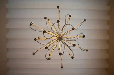 a rendering of a chandelier hanging on a wall at Casa Plaza de las Flores Cádiz Grupo AC Gestión in Cádiz
