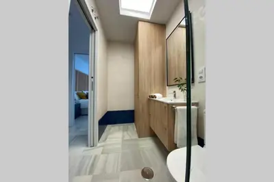a bathroom with a sink and a glass shower at Palacio Caballeros. Parking/Wifi in Jerez de la Frontera