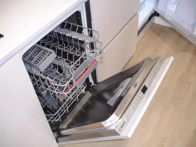 an open dishwasher in a kitchen with at Kiana Loft, La Casa del Parral in Jerez de la Frontera