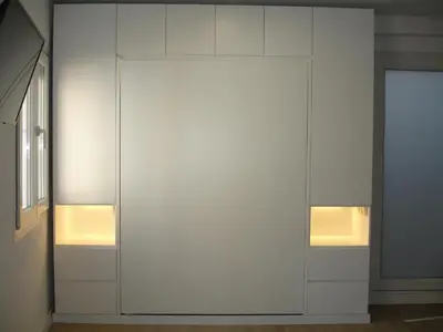 a white closet with two lights on top of it at Kiana Loft, La Casa del Parral in Jerez de la Frontera