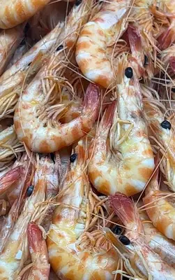 a pile of patties of shrimp are piled at Loft CENTRO San Diego in Sanlúcar de Barrameda