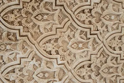 a close up of a carving on a wall at Apartamento Garum in Cádiz