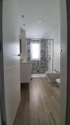 a bathroom with a tub and a toilet and a sink at Cádiz desde el balcón in Cádiz