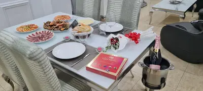 a table with plates of food on top of it at Oceanum Visum Spa Deluxe in El Trocadero