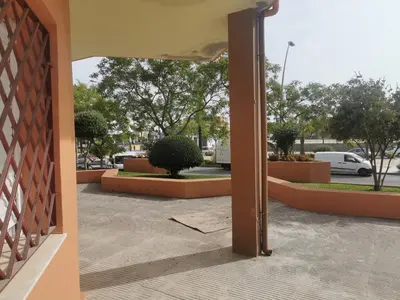 an open door of a building with a courtyard at Apartamentos Sanlúcar Beach 4 y 5 in Sanlúcar de Barrameda