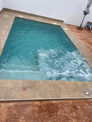 a large pool of water in a room at Casita Rural CONIL in Conil de la Frontera