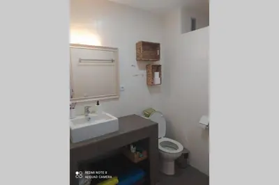 a bathroom with a sink and a toilet at Atico con terraza en San Fernando (Cádiz) in San Fernando