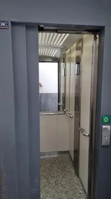 a bathroom with a glass door and a mirror at Green Home by Cadiz Time in Cádiz