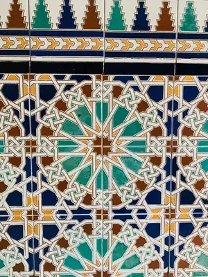 a close up of a tile pattern on a building at Casa Miguel - Apartamento 4 in Sanlúcar de Barrameda