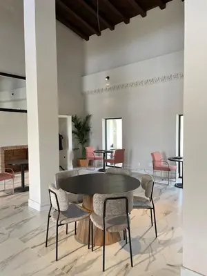 a dining room with a table and chairs at Hacienda Soto-Hego Haizea in Chiclana de la Frontera