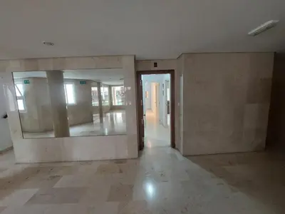 an empty room with a door and a hallway at Piso Bajo Guía in Sanlúcar de Barrameda