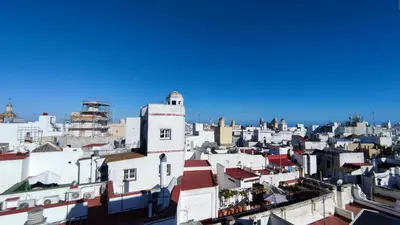 a view of the roofs of buildings at APARTAMENTOS MINA4 tipo I in Cádiz
