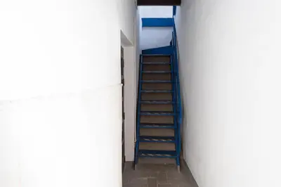 a ladder leading up to a bunk bed in a room at Apartment La Gitanilla terrace in Cádiz