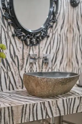 a bowl on a table in front of a mirror at La Casa de Carmen Centro Historico , Free Parking in Cádiz