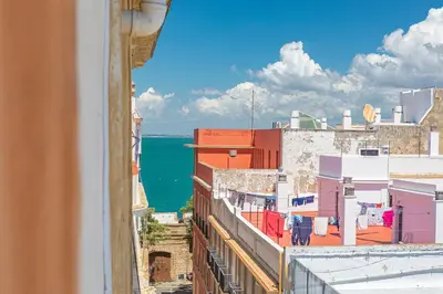 a view of the ocean from a building at New Use Pz España in Cádiz