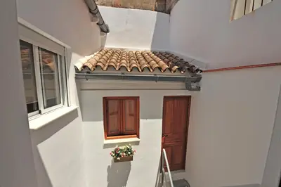 a small house with a window and a door at Original Céntrico Bohemio in Jerez de la Frontera