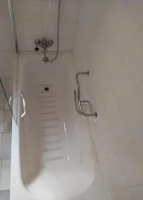 a white bath tub in a bathroom with a shower at Apartamento S. Fernando bahia sur in San Fernando