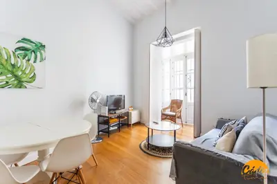 a living room with a couch and a table at Sagasta 1750 by Cadiz Time in Cádiz