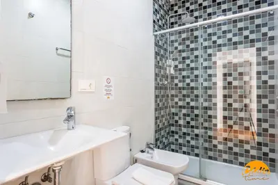 a bathroom with a sink and a toilet at Sagasta 1750 by Cadiz Time in Cádiz