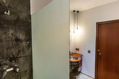a bathroom with a sink and a shower at SH La Casa del Capitán. Cerca de la catedral. in Cádiz