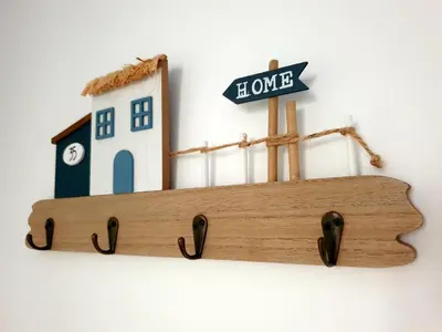a wooden shelf with a house and a sign at Sherryflat Cádiz in Cádiz