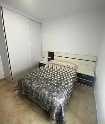 a bedroom with a bed in a room at Villa Raquel in Conil de la Frontera