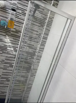 a glass window in a building with a ceiling at Casa Xeneize Punta Candor in Cádiz