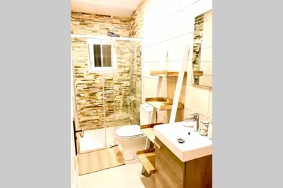 a bathroom with a sink and a toilet at Agradable casa de campo con piscina en la Barrosa in Chiclana de la Frontera