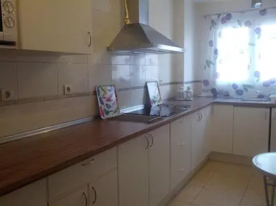 a kitchen with a sink and a counter top at Piso con parking en el edificio, Rio san pedro, CADIZ in El Trocadero