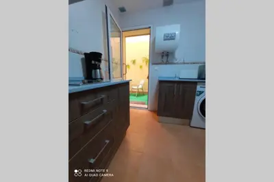 a kitchen with a sink and a counter at Apartamento cabañiles wifi in Jerez de la Frontera