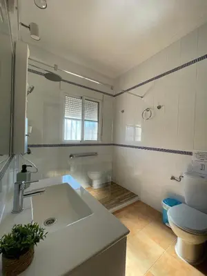 a bathroom with a sink and a toilet at casa lucia in Cádiz
