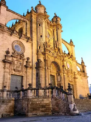 an old building with a fence in front of it at Sherryflat Atípika in Jerez de la Frontera