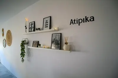 a white wall with shelves on a wall at Sherryflat Atípika in Jerez de la Frontera